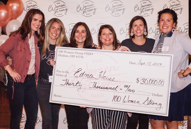 Edna House representatives with MaryJo and Jenn holding big check at giving event