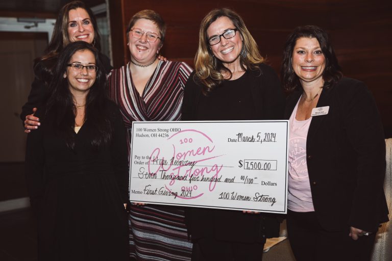 Group of women from Hope recovery with founders of 100 Women Strong strong